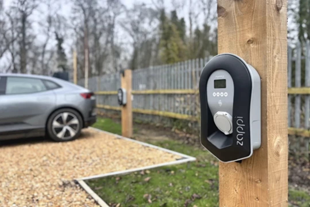 Sustainable building with EV charging on site.